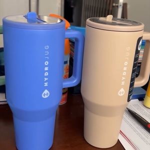 HydroJugs new with tags; pink and cranberry used once with water.